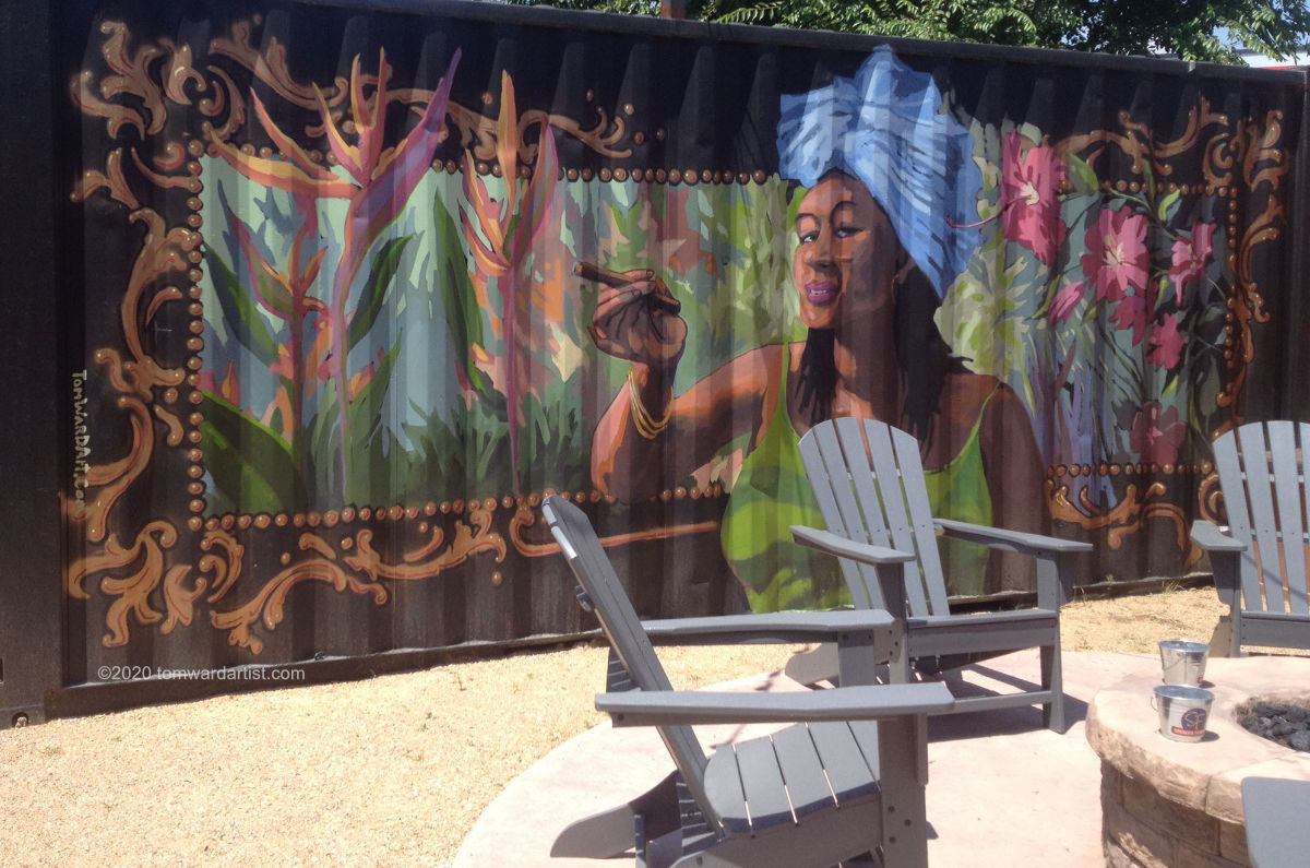 cuban mural painting cigar girl art on shipping container in Long Mont Colorado
