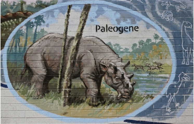 Denver Paleogene Uintatherium mural painting Colorado art Best Western Hotel