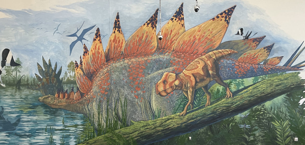 Stegosaurus dinosaur mural painting Amazon Warehouse in Thornton Colorado